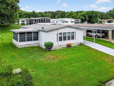 This beautiful open floorplan 2 bedroom/2 bath overlooks some of on Zellwood Station Country Club in Florida - for sale on GolfHomes.com, golf home, golf lot