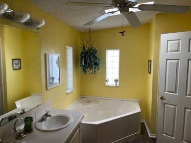 Charming and Light-Filled - This Beautiful Home Boasts an on Four Lakes Golf Club in Florida - for sale on GolfHomes.com, golf home, golf lot