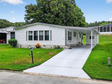 This beautiful open floorplan 2 bedroom/2 bath overlooks some of on Zellwood Station Country Club in Florida - for sale on GolfHomes.com, golf home, golf lot