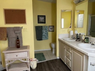 Charming and Light-Filled - This Beautiful Home Boasts an on Four Lakes Golf Club in Florida - for sale on GolfHomes.com, golf home, golf lot
