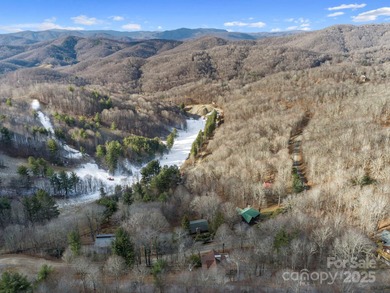 Mountain view homesite, now triple the size. This combined 3-lot on Wolf Laurel Country Club in North Carolina - for sale on GolfHomes.com, golf home, golf lot