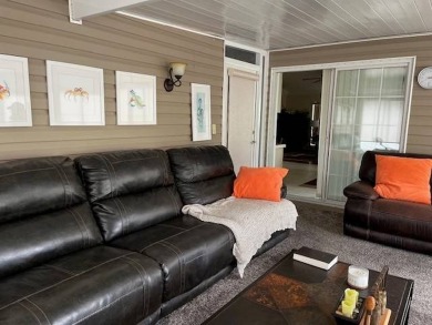 Charming and Light-Filled - This Beautiful Home Boasts an on Four Lakes Golf Club in Florida - for sale on GolfHomes.com, golf home, golf lot