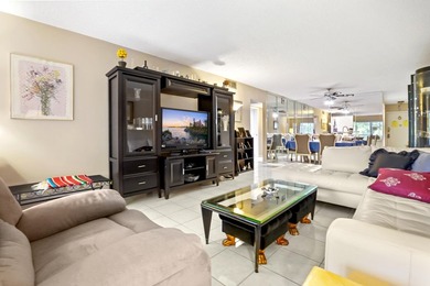 WASHER/DRYER INSIDE THE CONDO Presenting this meticulously on Wynmoor Golf Course in Florida - for sale on GolfHomes.com, golf home, golf lot