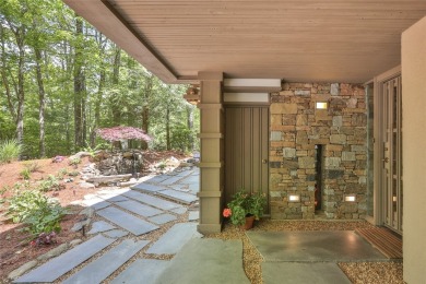 Discover a bright and airy home in Wildcat Cliffs Country Club on Wildcat Cliffs Country Club in North Carolina - for sale on GolfHomes.com, golf home, golf lot