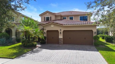 Discover luxury living in this exquisite five-bedroom on Eagle Creek Golf Club in Florida - for sale on GolfHomes.com, golf home, golf lot