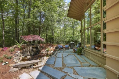 Discover a bright and airy home in Wildcat Cliffs Country Club on Wildcat Cliffs Country Club in North Carolina - for sale on GolfHomes.com, golf home, golf lot