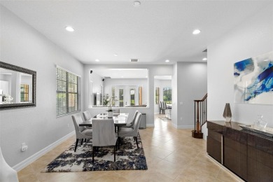 Discover luxury living in this exquisite five-bedroom on Eagle Creek Golf Club in Florida - for sale on GolfHomes.com, golf home, golf lot
