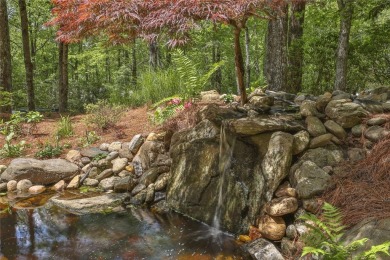Discover a bright and airy home in Wildcat Cliffs Country Club on Wildcat Cliffs Country Club in North Carolina - for sale on GolfHomes.com, golf home, golf lot