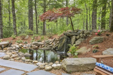 Discover a bright and airy home in Wildcat Cliffs Country Club on Wildcat Cliffs Country Club in North Carolina - for sale on GolfHomes.com, golf home, golf lot