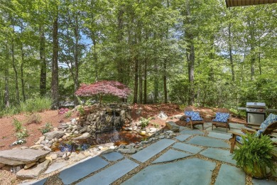 Discover a bright and airy home in Wildcat Cliffs Country Club on Wildcat Cliffs Country Club in North Carolina - for sale on GolfHomes.com, golf home, golf lot