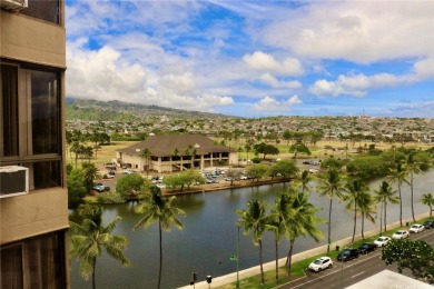 Enjoy stunning views of the golf course, Ala Wai Canal, and on Ala Wai Golf Course in Hawaii - for sale on GolfHomes.com, golf home, golf lot