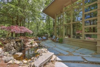 Discover a bright and airy home in Wildcat Cliffs Country Club on Wildcat Cliffs Country Club in North Carolina - for sale on GolfHomes.com, golf home, golf lot