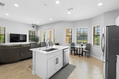Discover luxury living in this exquisite five-bedroom on Eagle Creek Golf Club in Florida - for sale on GolfHomes.com, golf home, golf lot