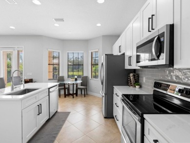 Discover luxury living in this exquisite five-bedroom on Eagle Creek Golf Club in Florida - for sale on GolfHomes.com, golf home, golf lot