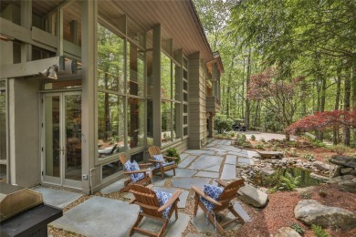 Discover a bright and airy home in Wildcat Cliffs Country Club on Wildcat Cliffs Country Club in North Carolina - for sale on GolfHomes.com, golf home, golf lot