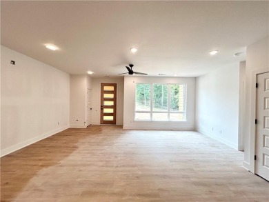 New construction on a spacious .31-acre wooded lot with a level on Bella Vista - Metfield Golf Complex and Country Club in Arkansas - for sale on GolfHomes.com, golf home, golf lot