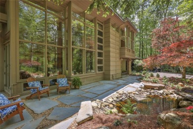 Discover a bright and airy home in Wildcat Cliffs Country Club on Wildcat Cliffs Country Club in North Carolina - for sale on GolfHomes.com, golf home, golf lot