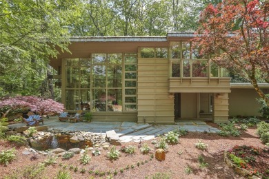 Discover a bright and airy home in Wildcat Cliffs Country Club on Wildcat Cliffs Country Club in North Carolina - for sale on GolfHomes.com, golf home, golf lot