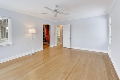 Tucked beneath a canopy of towering trees, located on a quiet on Biltmore Country Club in Illinois - for sale on GolfHomes.com, golf home, golf lot