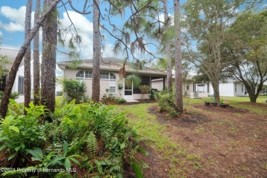 Easy, breezy Florida living? You betcha! This lovely Silverthorn on Silverthorn Country Club in Florida - for sale on GolfHomes.com, golf home, golf lot