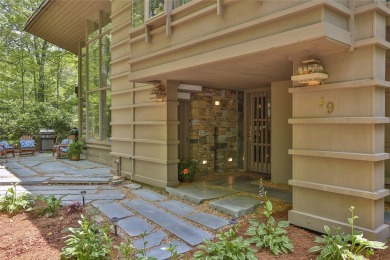 Discover a bright and airy home in Wildcat Cliffs Country Club on Wildcat Cliffs Country Club in North Carolina - for sale on GolfHomes.com, golf home, golf lot