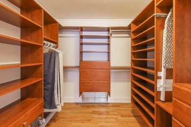 Tucked beneath a canopy of towering trees, located on a quiet on Biltmore Country Club in Illinois - for sale on GolfHomes.com, golf home, golf lot