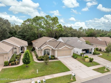 Easy, breezy Florida living? You betcha! This lovely Silverthorn on Silverthorn Country Club in Florida - for sale on GolfHomes.com, golf home, golf lot