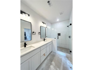 New construction on a spacious .31-acre wooded lot with a level on Bella Vista - Metfield Golf Complex and Country Club in Arkansas - for sale on GolfHomes.com, golf home, golf lot