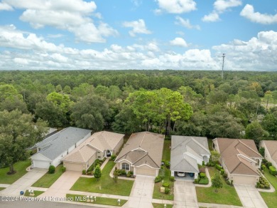 Easy, breezy Florida living? You betcha! This lovely Silverthorn on Silverthorn Country Club in Florida - for sale on GolfHomes.com, golf home, golf lot