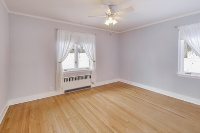 Tucked beneath a canopy of towering trees, located on a quiet on Biltmore Country Club in Illinois - for sale on GolfHomes.com, golf home, golf lot