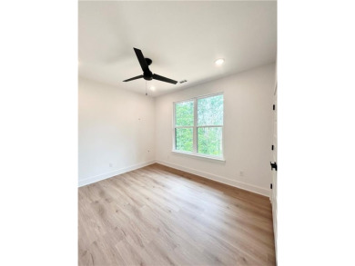 New construction on a spacious .31-acre wooded lot with a level on Bella Vista - Metfield Golf Complex and Country Club in Arkansas - for sale on GolfHomes.com, golf home, golf lot