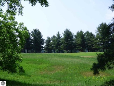 Beautiful, and lightly treed, lot overlooking the 4th fairway at on Shanty Creek Golf Course in Michigan - for sale on GolfHomes.com, golf home, golf lot