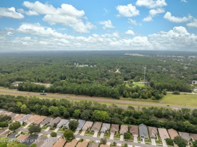 Easy, breezy Florida living? You betcha! This lovely Silverthorn on Silverthorn Country Club in Florida - for sale on GolfHomes.com, golf home, golf lot