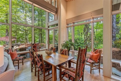 Discover a bright and airy home in Wildcat Cliffs Country Club on Wildcat Cliffs Country Club in North Carolina - for sale on GolfHomes.com, golf home, golf lot