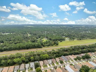 Easy, breezy Florida living? You betcha! This lovely Silverthorn on Silverthorn Country Club in Florida - for sale on GolfHomes.com, golf home, golf lot