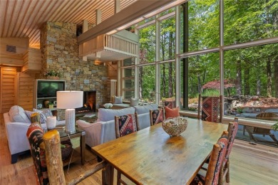 Discover a bright and airy home in Wildcat Cliffs Country Club on Wildcat Cliffs Country Club in North Carolina - for sale on GolfHomes.com, golf home, golf lot