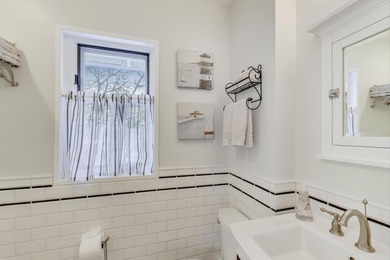 Tucked beneath a canopy of towering trees, located on a quiet on Biltmore Country Club in Illinois - for sale on GolfHomes.com, golf home, golf lot