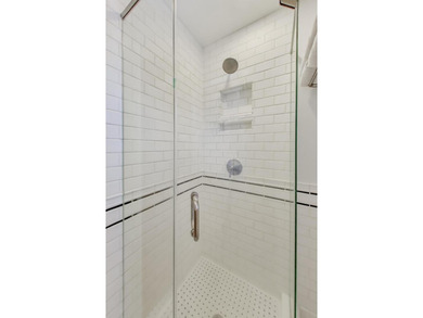 Tucked beneath a canopy of towering trees, located on a quiet on Biltmore Country Club in Illinois - for sale on GolfHomes.com, golf home, golf lot