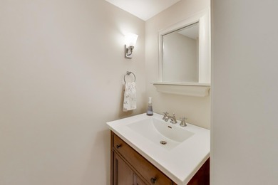 Tucked beneath a canopy of towering trees, located on a quiet on Biltmore Country Club in Illinois - for sale on GolfHomes.com, golf home, golf lot