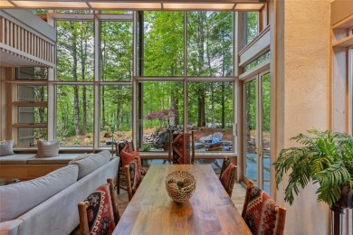 Discover a bright and airy home in Wildcat Cliffs Country Club on Wildcat Cliffs Country Club in North Carolina - for sale on GolfHomes.com, golf home, golf lot