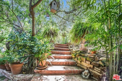 Welcome to the Chalet on the Hill, a stunning storybook home on Woodland Hills Country Club in California - for sale on GolfHomes.com, golf home, golf lot