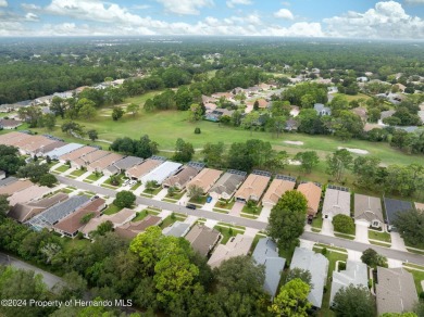 Easy, breezy Florida living? You betcha! This lovely Silverthorn on Silverthorn Country Club in Florida - for sale on GolfHomes.com, golf home, golf lot