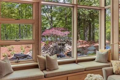 Discover a bright and airy home in Wildcat Cliffs Country Club on Wildcat Cliffs Country Club in North Carolina - for sale on GolfHomes.com, golf home, golf lot