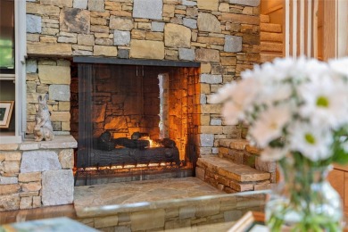 Discover a bright and airy home in Wildcat Cliffs Country Club on Wildcat Cliffs Country Club in North Carolina - for sale on GolfHomes.com, golf home, golf lot