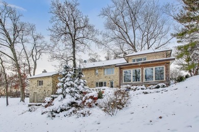 Tucked beneath a canopy of towering trees, located on a quiet on Biltmore Country Club in Illinois - for sale on GolfHomes.com, golf home, golf lot