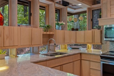 Discover a bright and airy home in Wildcat Cliffs Country Club on Wildcat Cliffs Country Club in North Carolina - for sale on GolfHomes.com, golf home, golf lot