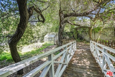 Welcome to the Chalet on the Hill, a stunning storybook home on Woodland Hills Country Club in California - for sale on GolfHomes.com, golf home, golf lot