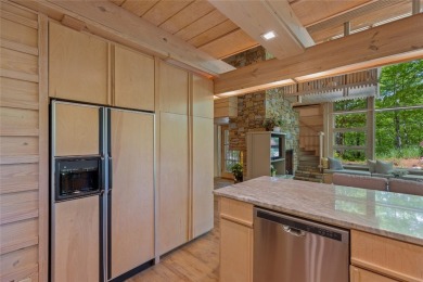 Discover a bright and airy home in Wildcat Cliffs Country Club on Wildcat Cliffs Country Club in North Carolina - for sale on GolfHomes.com, golf home, golf lot