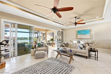 Stunning lakefront home in the desirable Materita neighborhood on Pelican Preserve Golf Club in Florida - for sale on GolfHomes.com, golf home, golf lot