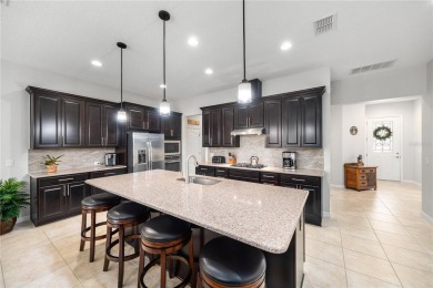 Discover tropical living without ever leaving Central Florida in on Mystic Dunes Resort and Golf Club in Florida - for sale on GolfHomes.com, golf home, golf lot